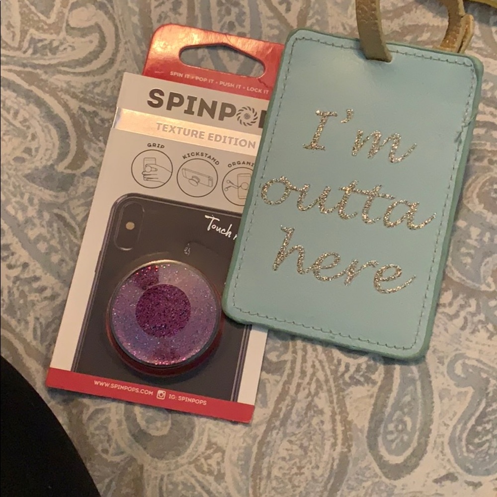 Traveling tag and pop socket